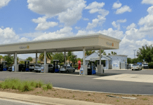 Walmart To Add Convenience Stores and Gas Stations To Locations In 34 States Walmart gas station with cars refueling